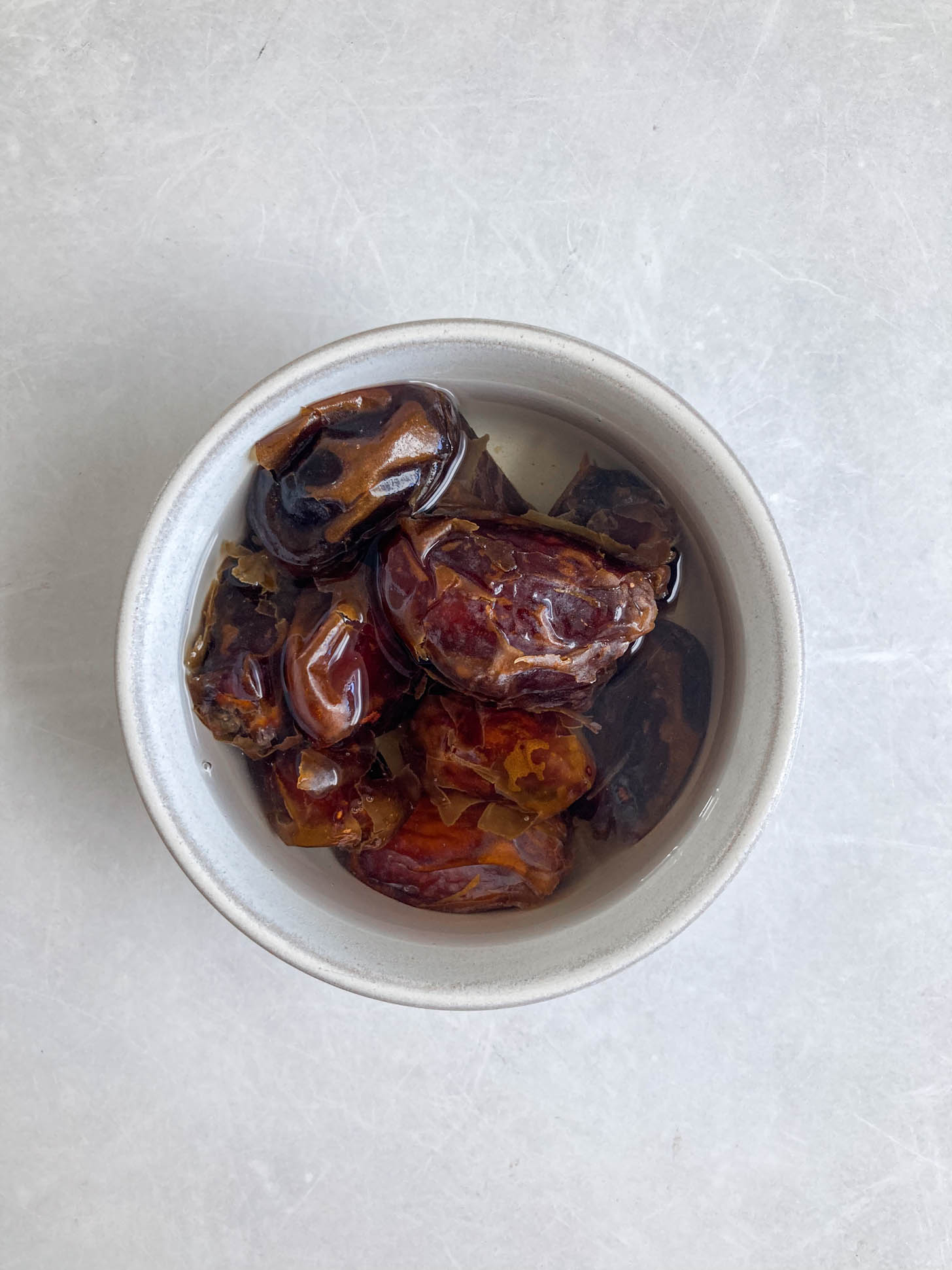 Dates covered in hot water.