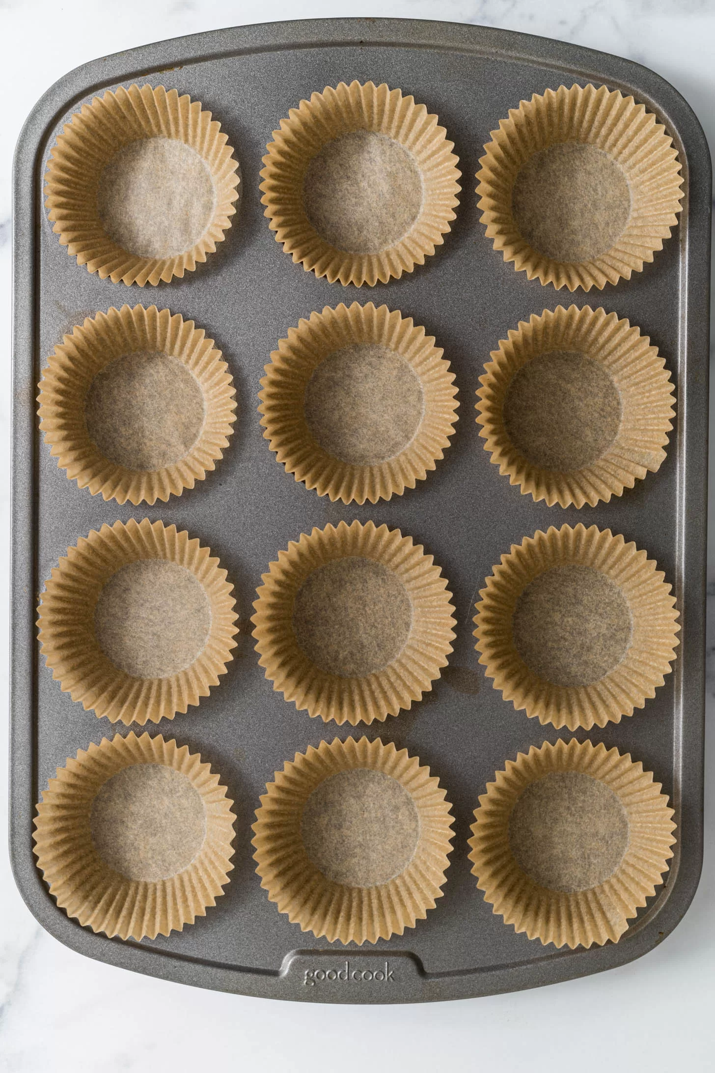 Muffin liners in a muffin tin.
