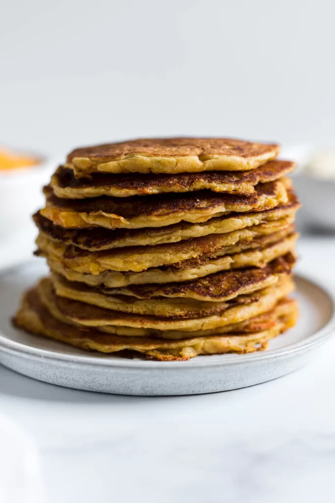 A stack of sweet potato pancakes.