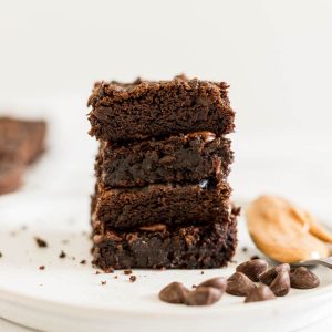 A stack of Peanut Butter Chickpea Brownies.