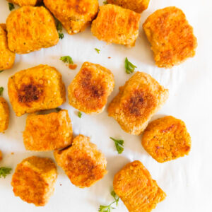 Some sweet potato tater tots scattered.