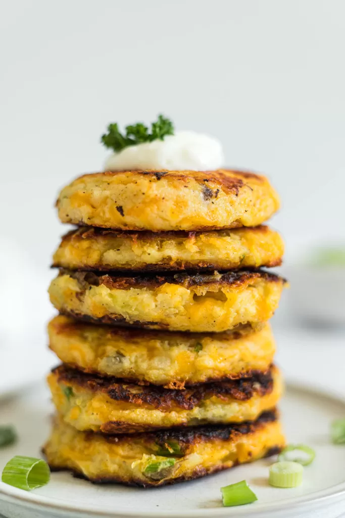 A large stack of Gluten-Free Leftover Mashed Potato Pancakes.