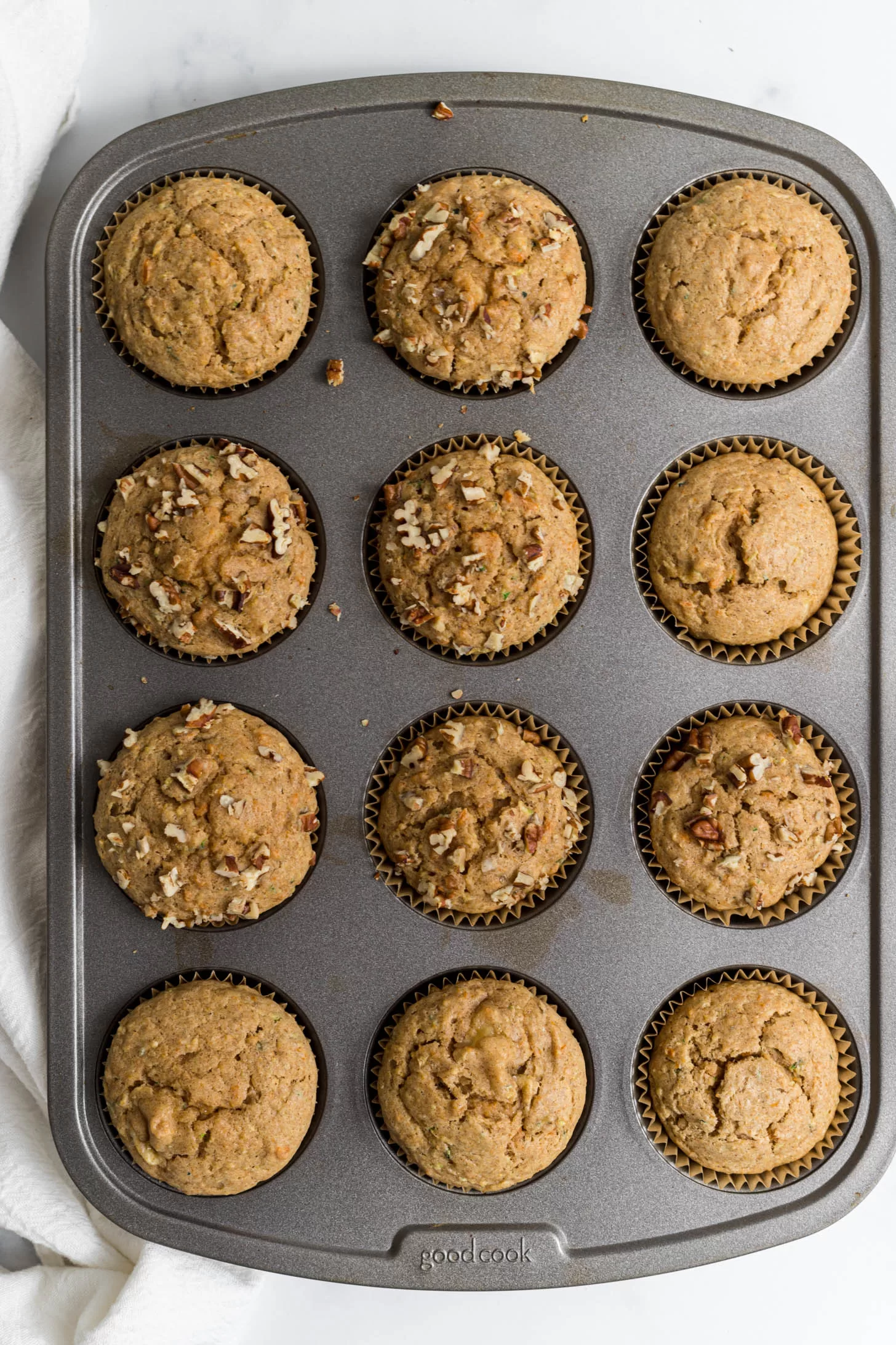 Cooked muffins in a muffin tin.