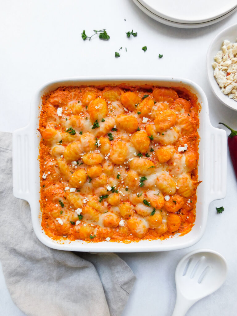 A baking dish with Roasted Red Pepper and Feta Baked Gnocchi.