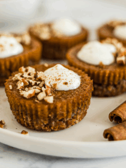 Mini pumpkin tarts on a plate.