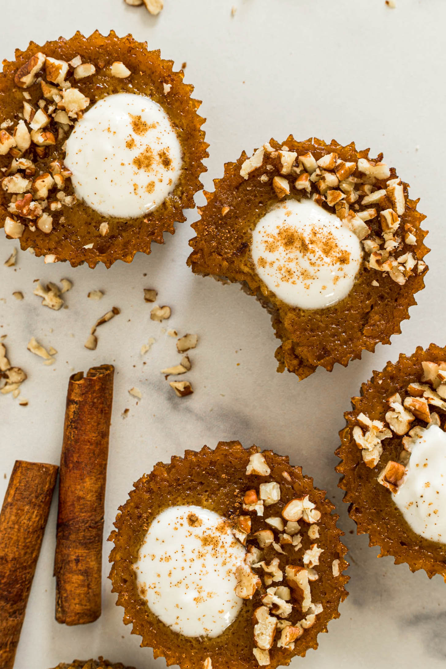 Pumpkin tarts with a bite out of it.