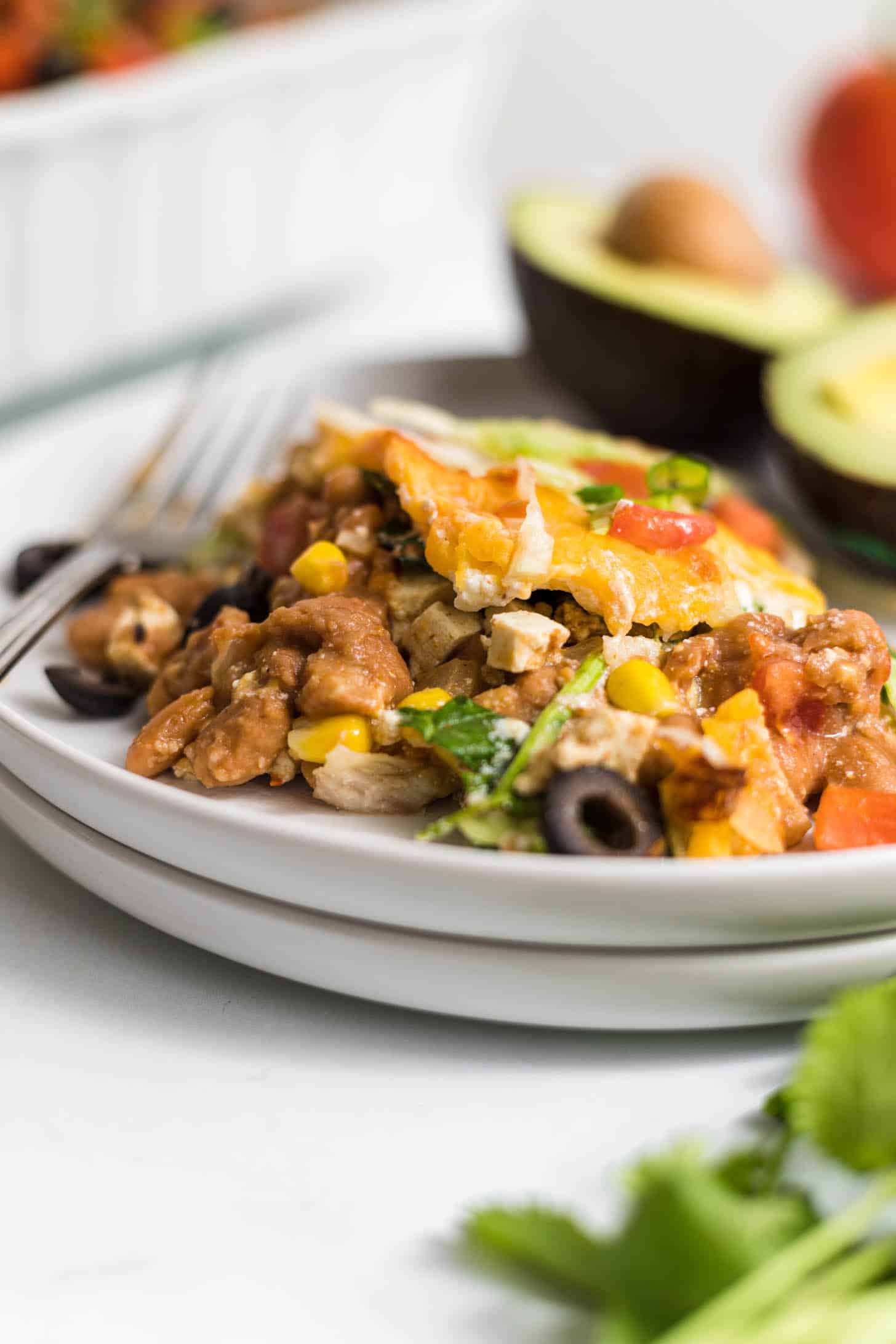A serving of taco casserole on a plate.