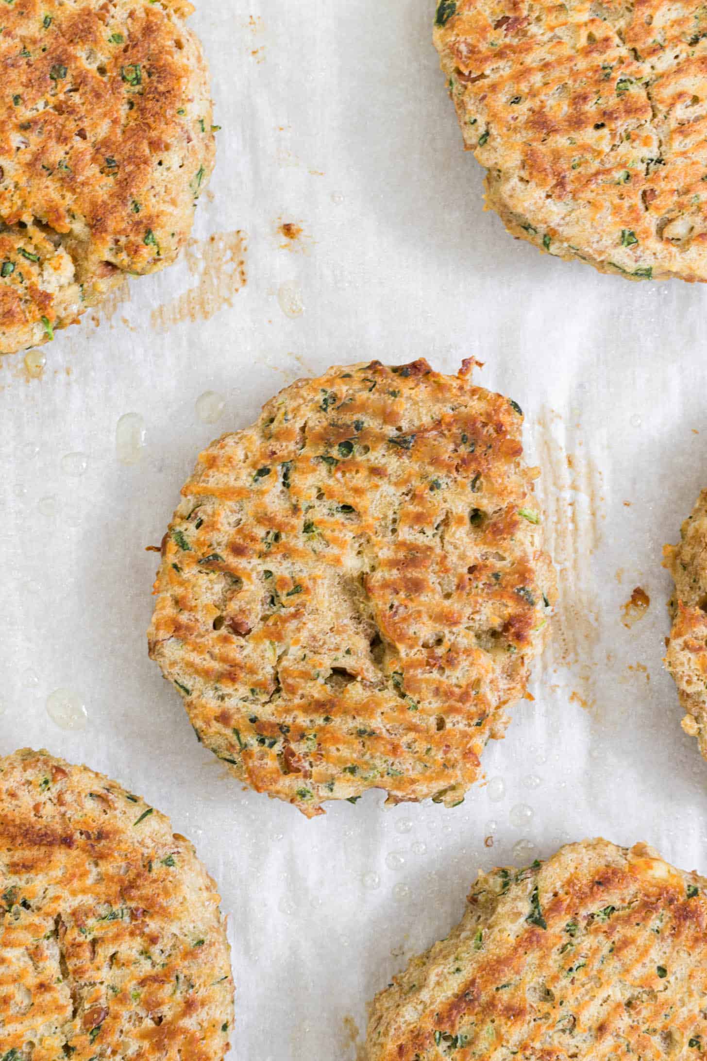 Cooked pinto bean burgers.