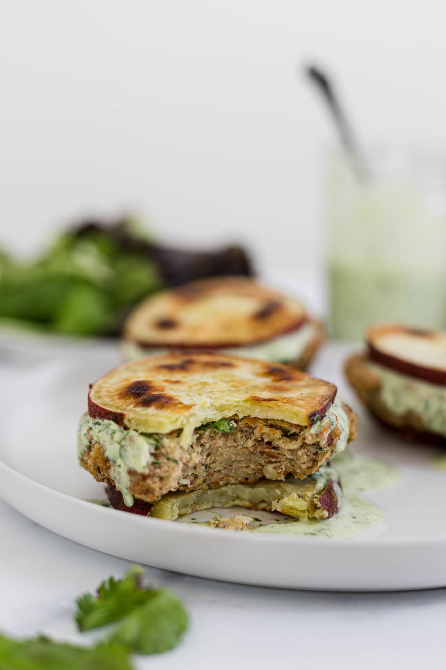 Pinto bean burger with a bite out of it.