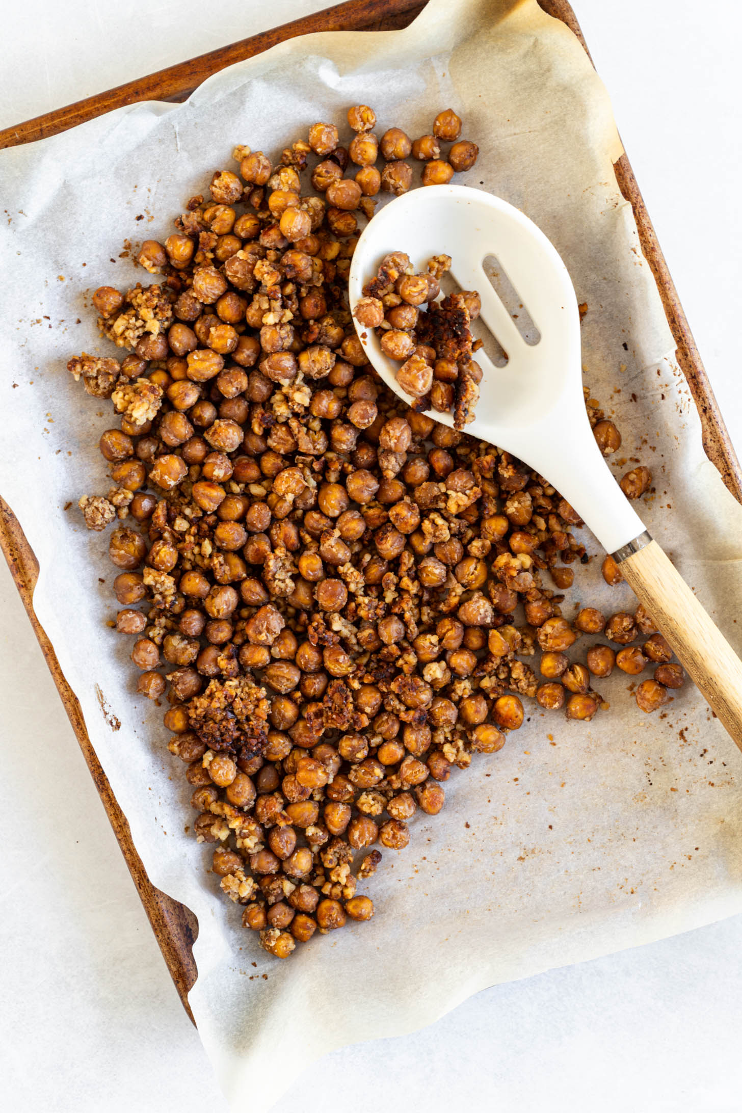 Roasted chickpeas on a baking sheet.