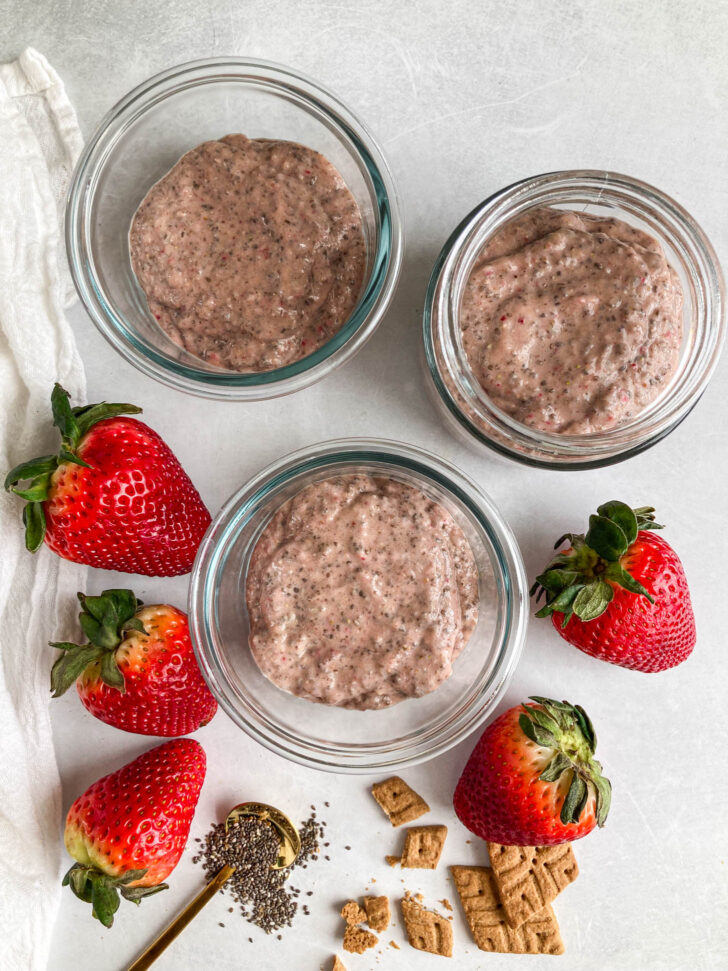 Chia pudding divided amongst three serving containers.