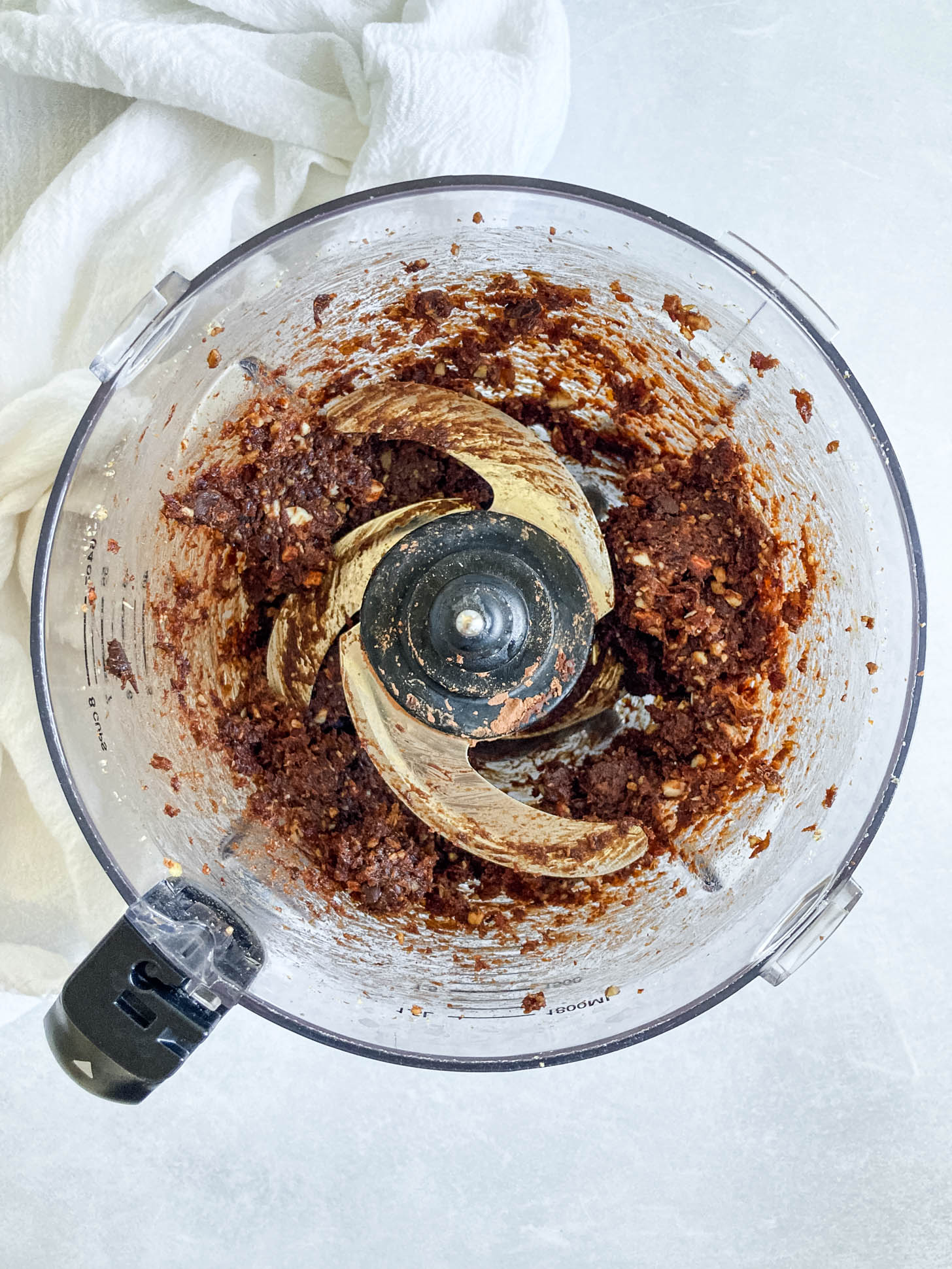 Brownie bar ingredients processed in a food processor.