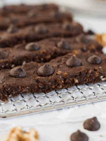Chocolate Chip Brownie Bars on a wire rack.