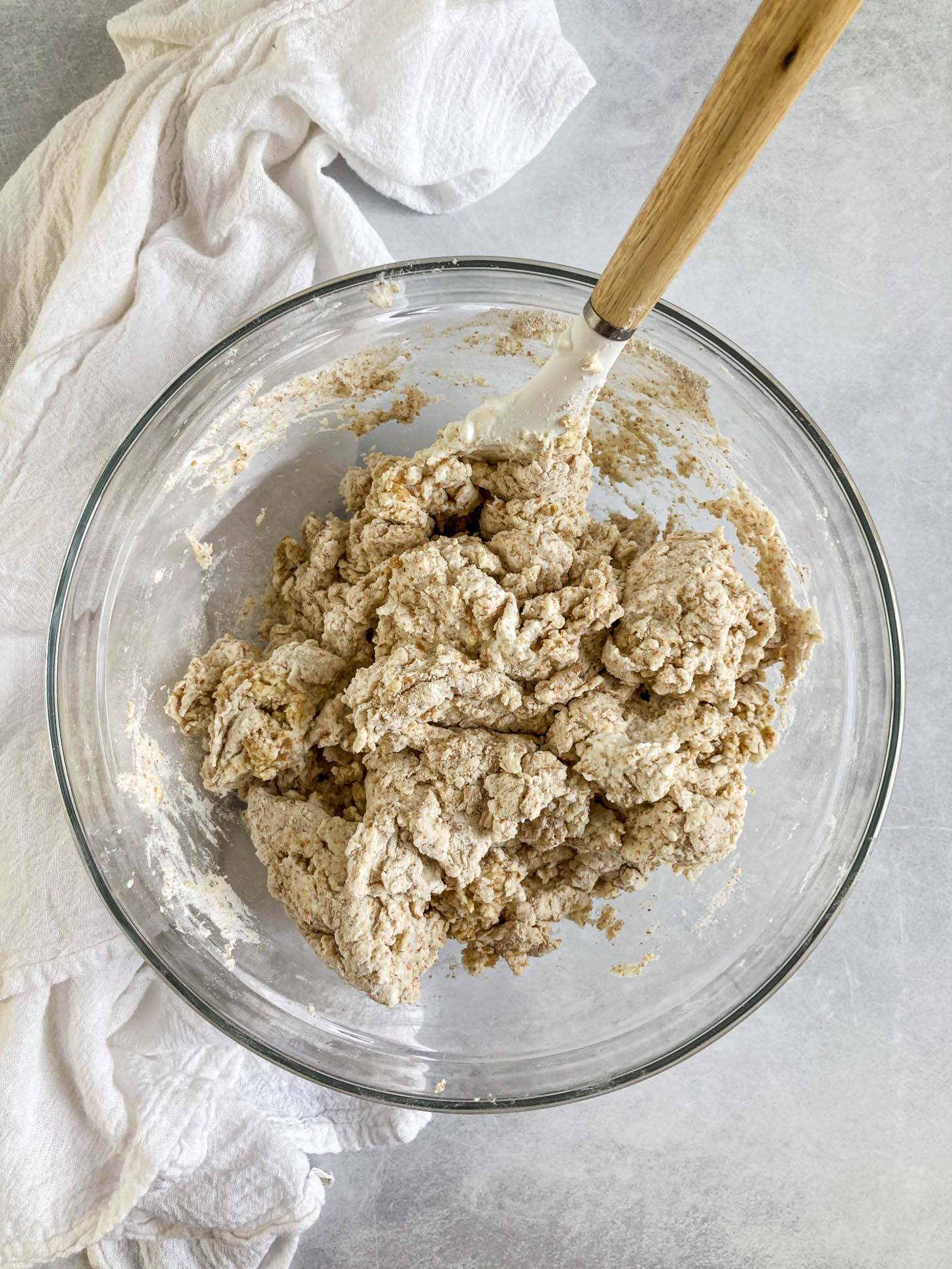 Pizza dough ingredients mixed in a bowl.