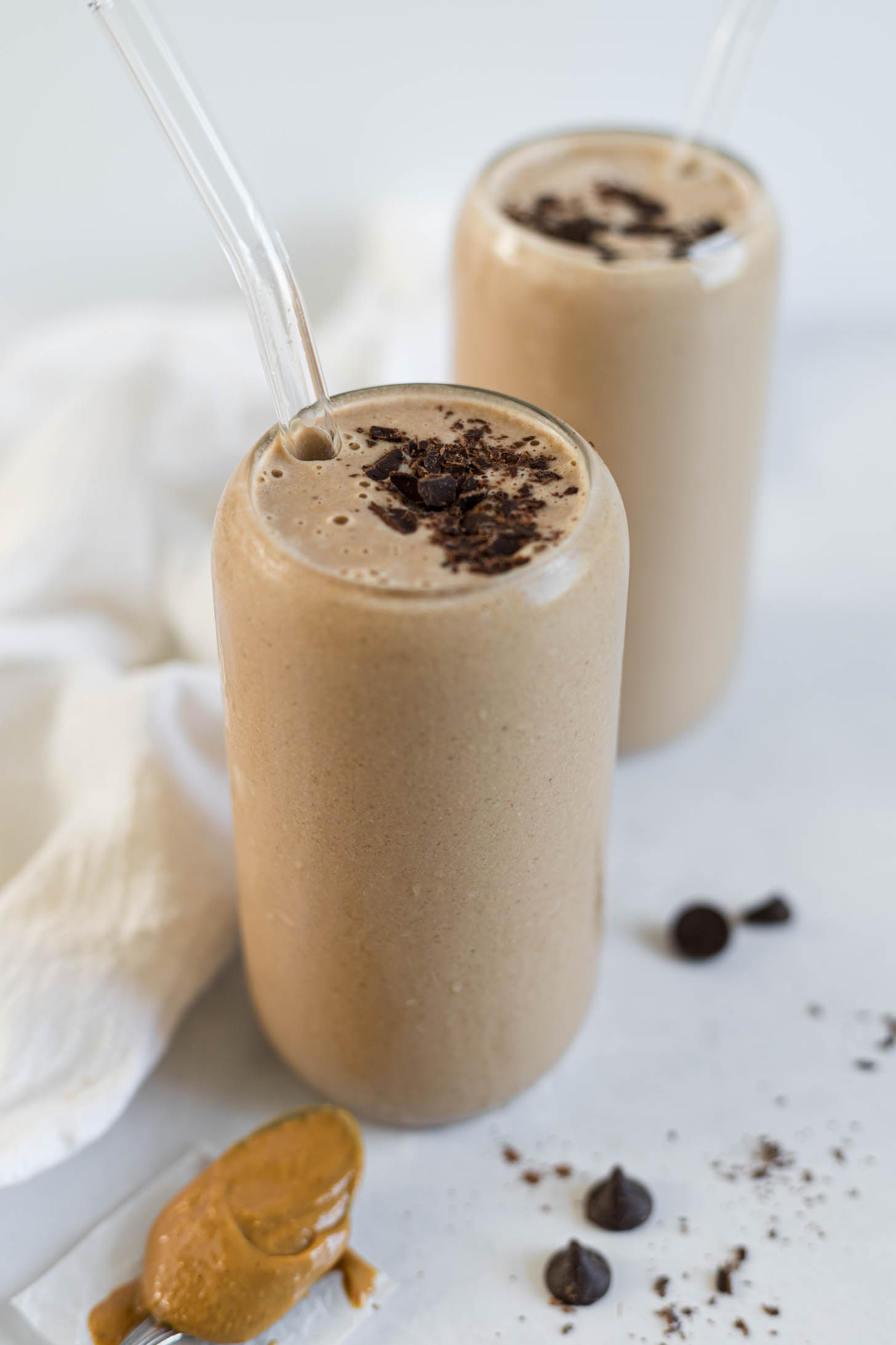 Two chocolate peanut butter smoothies.