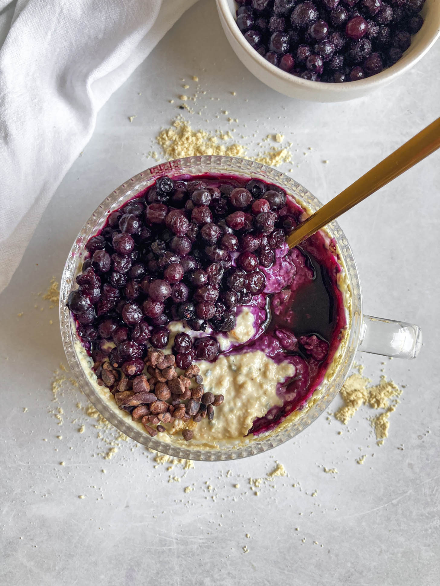 Blueberries added on top of yogurt bowl.