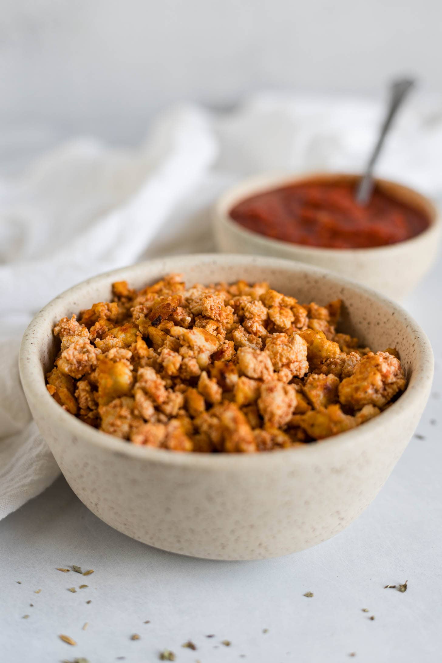 Bowl of tofu crumbles.