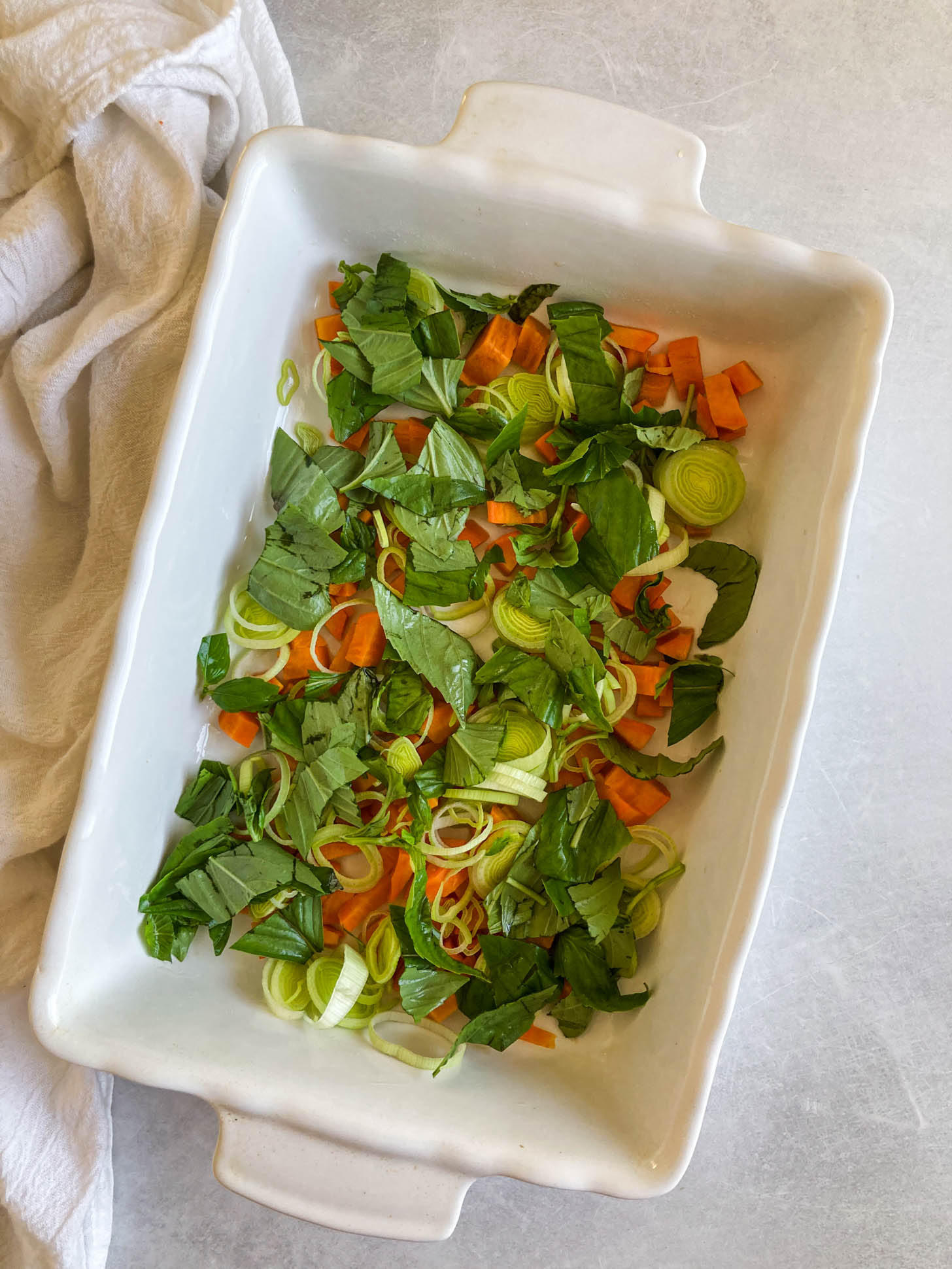 Veggies in a baking dish.
