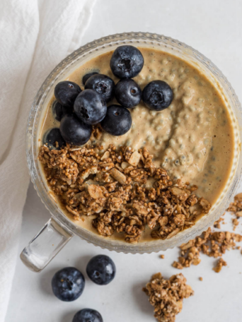 Basil seed pudding with blueberries and granola.