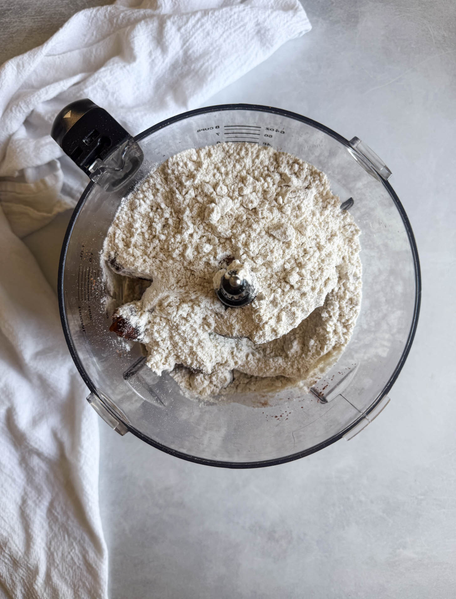 Ingredients added to a food processor.