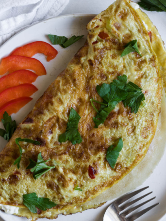 Tortilla omelette on a plate.