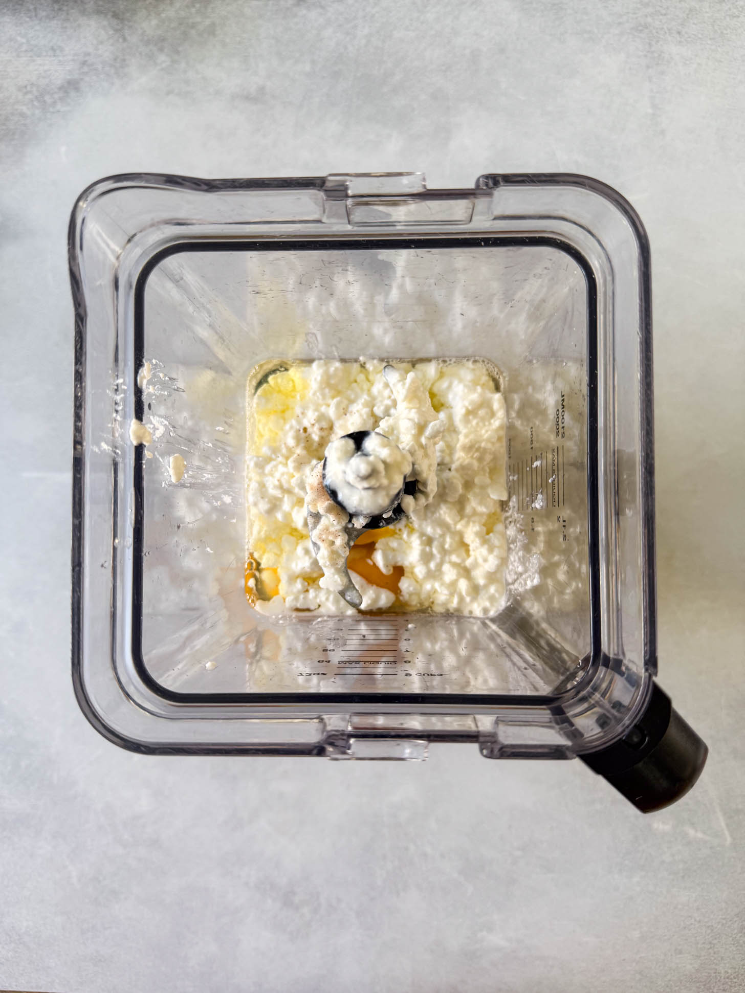 Ingredients for the egg bake added to a blender.