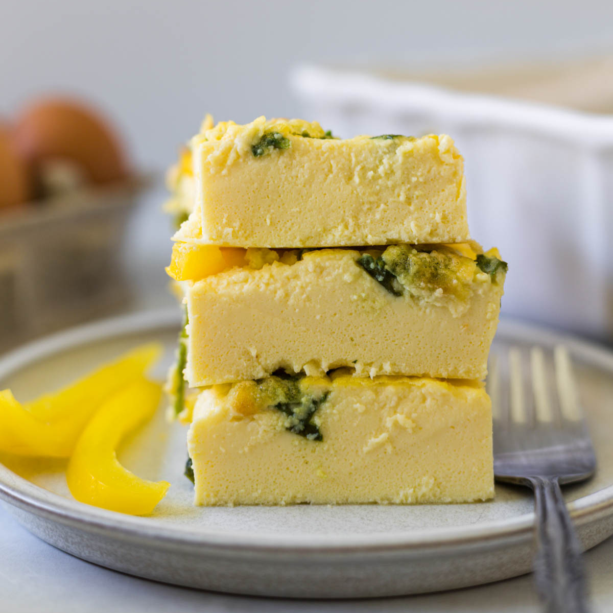 Stack of cottage cheese egg bake slices.