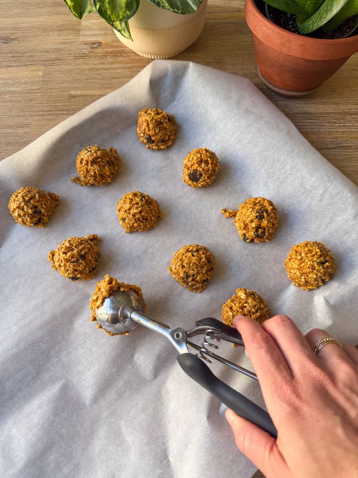Cookies scooped on a baking sheet.