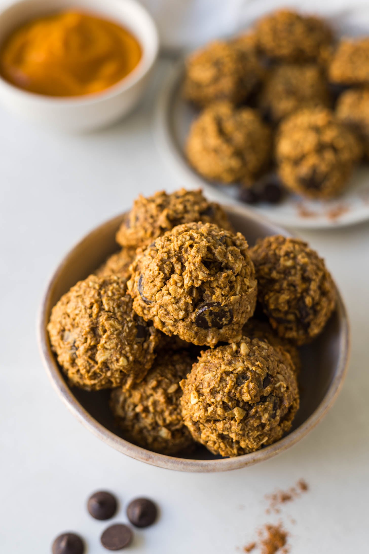 Pumpkin cookies in a bowl.