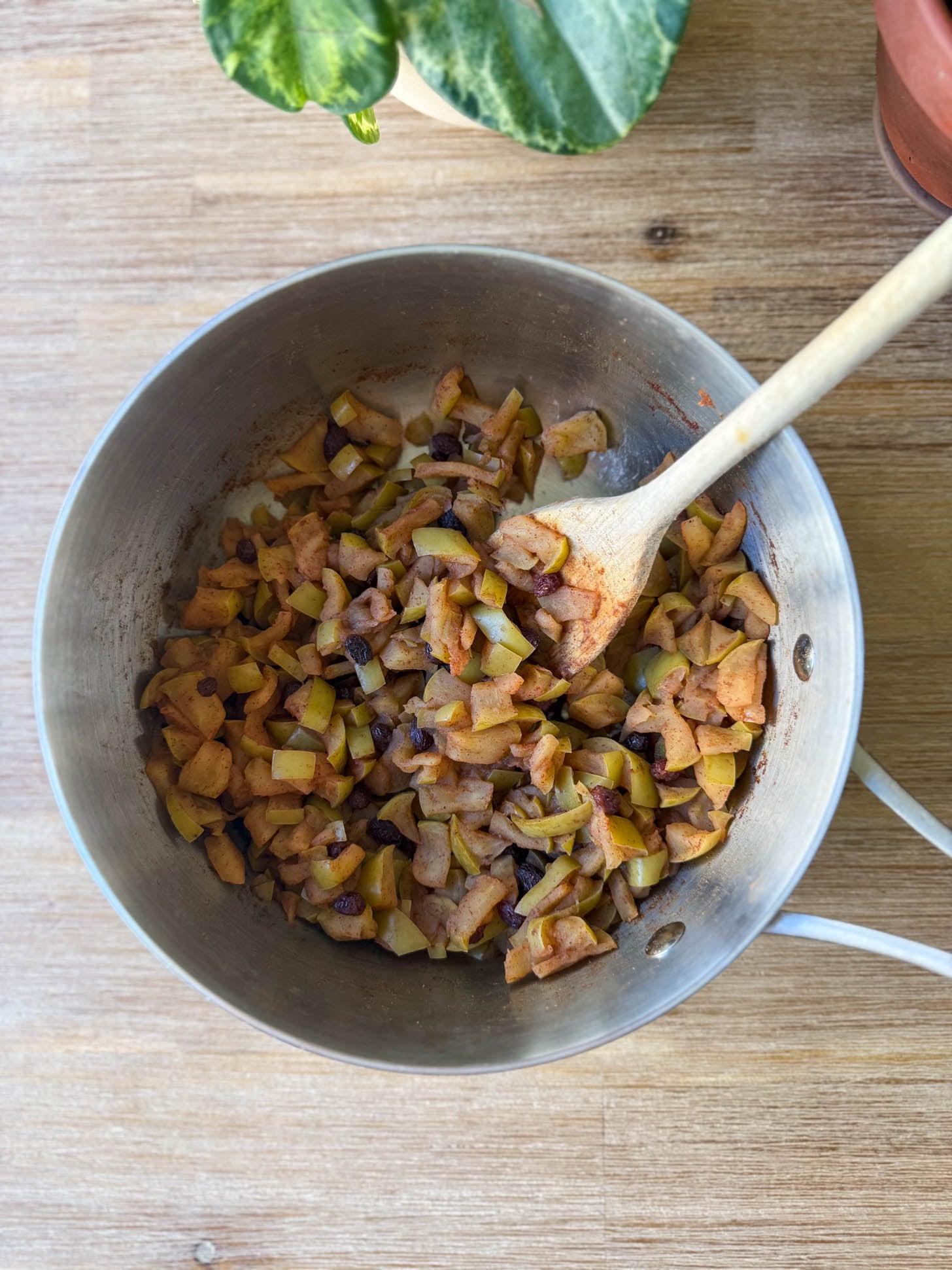 Apple compote cooked down in a pot.