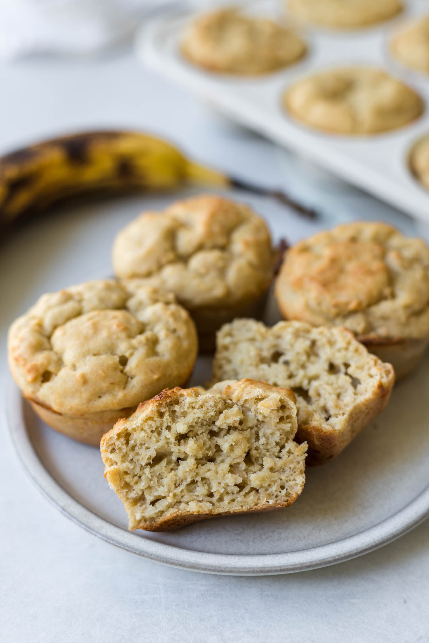 Cottage cheese banana muffins on a plate.